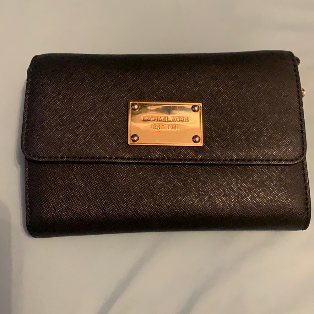 Mk crossbody bag small still in a good condition
